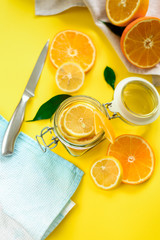 Top view of sliced oranges and lemons