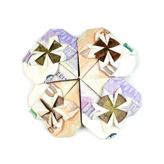 Czech money banknotes folded in heart shape on white background, Cloverleaf shape