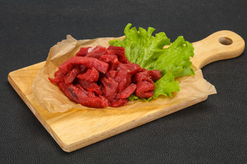 Raw beef meat sliced for cooking