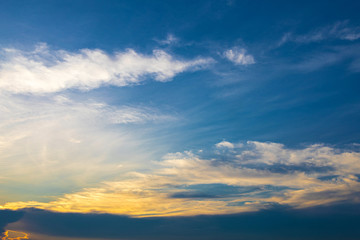 Dramatic sky with cloud at sunset for background wallpaper.