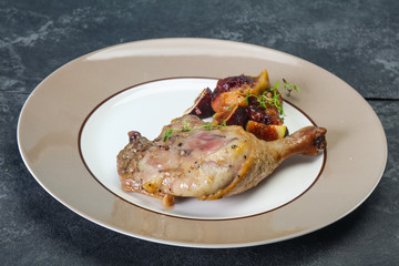 Roasted. duck. leg with plum and apple