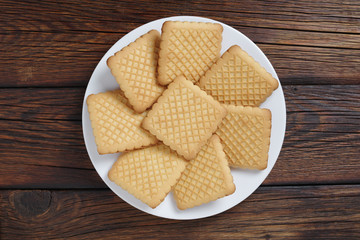 Square cookies on a plate