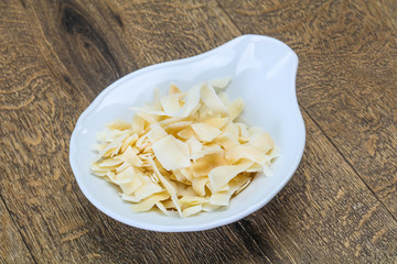 Coconut dry chips in the bowl