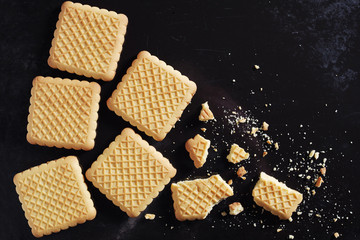 Square cookies on black