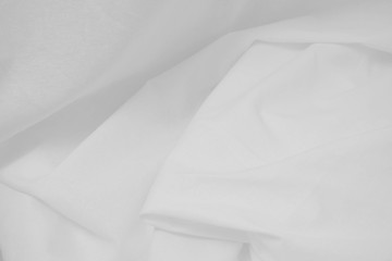 Rippled white cotton fabric texture background