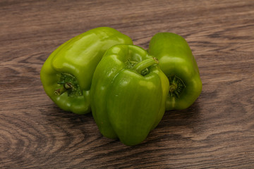 Three green bell juicy peppers