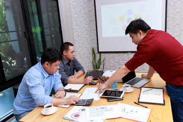 Fototapeta premium Small and Medium Enterprise Business concept of ,Businessman presenting investment plan to his partner in office.