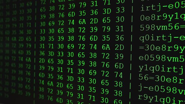 Program HEX code on scientific device screen, green text ASCI information, 4K UHD video