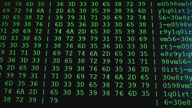 Program HEX code on scientific device screen, green text ASCI information, 4K UHD video