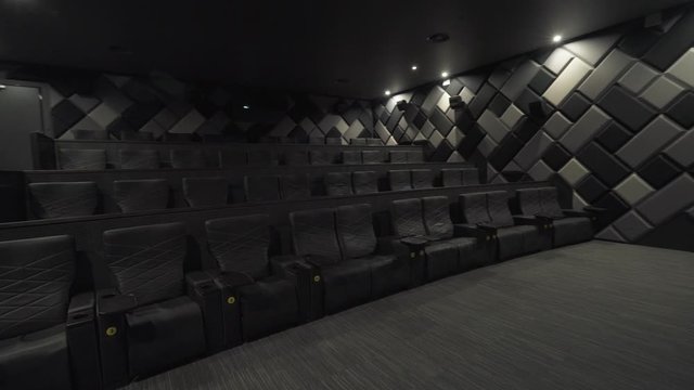 Modern cinema, view of seats in a modern cinema, comfortable chairs in the cinema interior.
