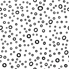 Abstract pattern with round shapes. Ovals placed in a chaotic manner. Color 2020. Vector seamless texture.