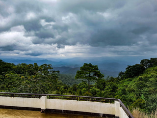 Fototapeta na wymiar Terrace view plattform point tree rain forest green valey mountain jungle tour pai north chiang mai thailand dark sky
