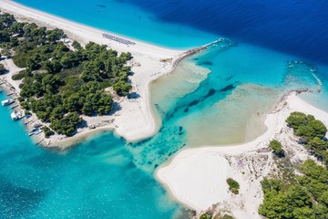 Aerial drone view of Port Glarokavos and lagoon beach in Kassandra penisula Chalkidiki Greece