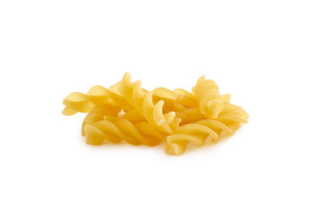 Heap of italian raw dry pasta fusilli isolated on white background