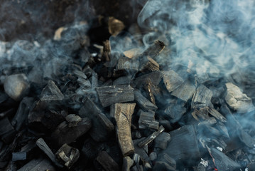 the coals texture smoldering and burning in the brazier with smok © gorbacheva777
