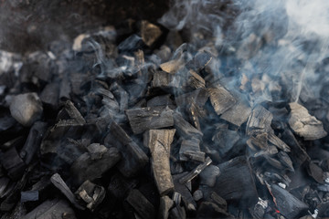 the coals texture smoldering and burning in the brazier with smok © gorbacheva777