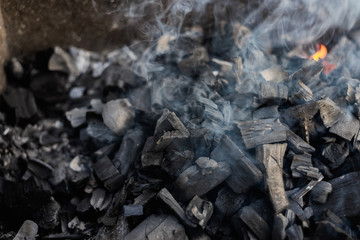 the coals texture smoldering and burning in the brazier with smok © gorbacheva777