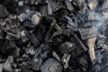 the coals texture smoldering and burning in the brazier with smok © gorbacheva777