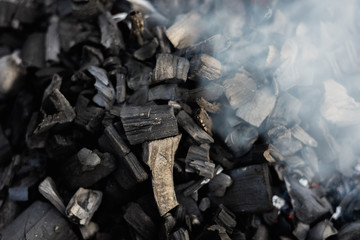 the coals texture smoldering and burning in the brazier with smok © gorbacheva777