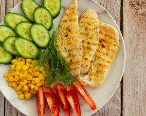 Vegetables with grilled chicken and dill