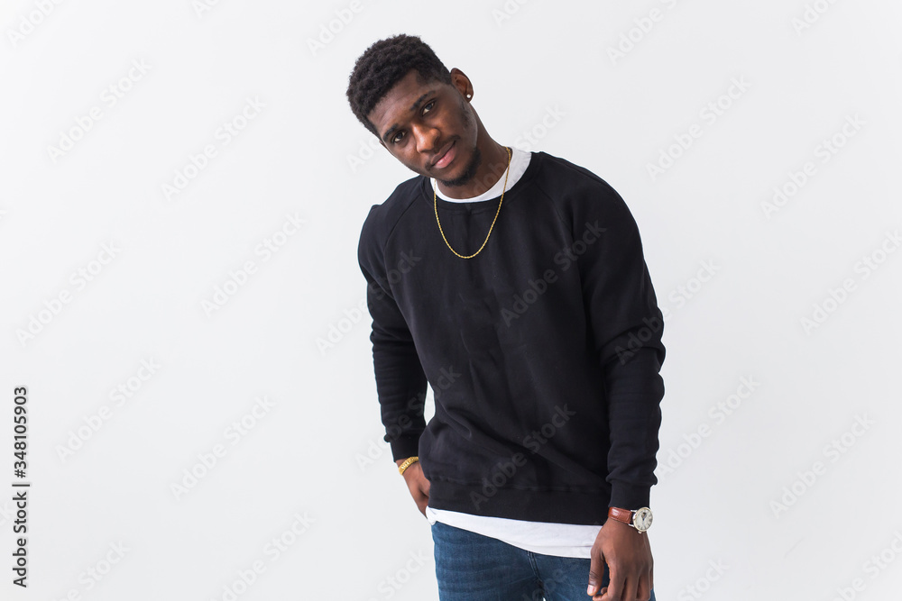 Sticker Young handsome african american man with an afro hairstyle. Portrait on white background with copy space. Guy looking at camera.