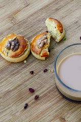 Walnut cookies and coffee with milk