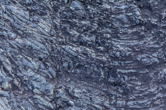 Texture And Background Of Petrified Lava. Prehistoric Rock Formation