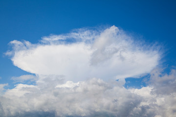 Unusual forms of clouds, a beautiful single cloud in the sky like a mushroom cap