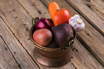 Healthy Organic Vegetables on a Wooden Background.