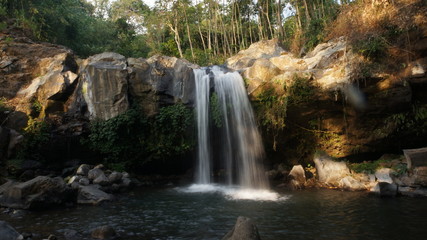 Fototapeta premium beautiful waterfall in the middle of the forest in central java, indonesia