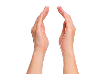 Protecting care female hands, isolated on white background. Empty human hands showing gestures, protection or measuring size of something. Beautiful hand of woman with copy space.