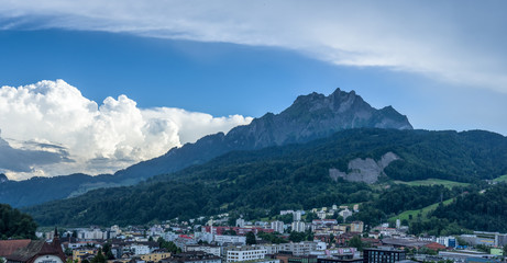 clouds are approaching mount pilatus and turning into a summer thunderstorm