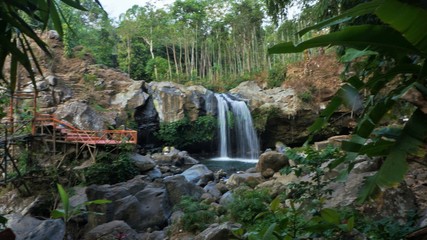 waterfall in the forest incentral java, indonesia
