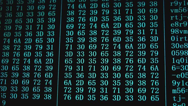 Program HEX code on scientific device screen, green text ASCI information, 4K UHD video