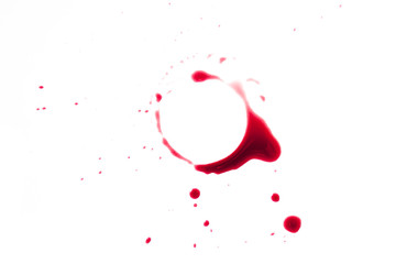 A red wine stain on a white background, a design template with a place for text or logo for a restaurant menu cover or a wine tasting invitation