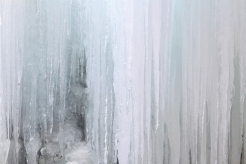 Icicles ice wall background.