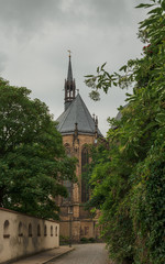 Alley along the fortress wall in Altenburg castle, with a view of the Church. Germany. Soft focus, blurry background.