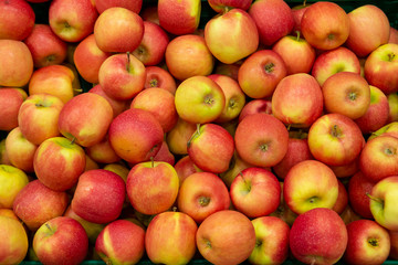 Close up red apples background.