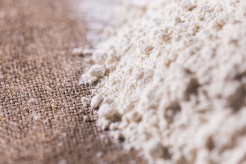 White flour on textile background texture photo