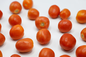 red tomatoes background. Group of tomatoes
