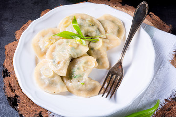 Polish pierogi filled with ramsons pesto