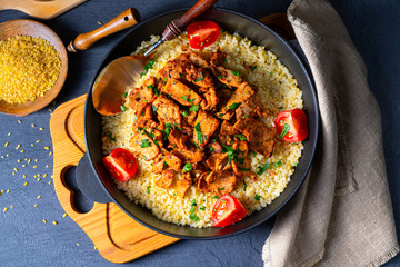 rustic bulgur pans with gratinated gyros and yoghurt
