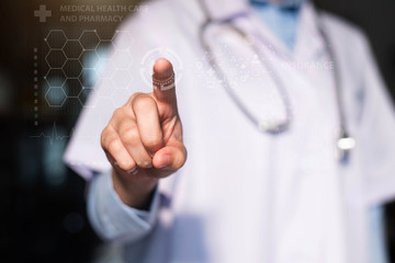 Doctor working on a digital tablet in hospital.