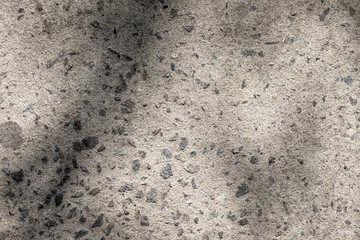 Gray cement plaster wall as background or texture.