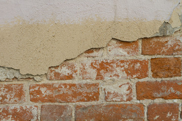 Old wall texture with brick. Cracked wall background.