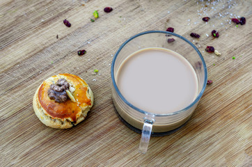 Walnut cookies and coffee with milk