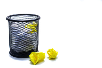 Stationery basket with crumpled pieces of paper