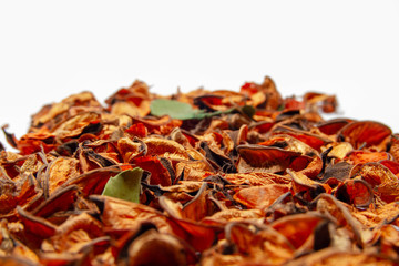 Dried potpourri leaves on white background shallow DOF