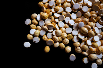 top view of Roasted gram isolated on black background