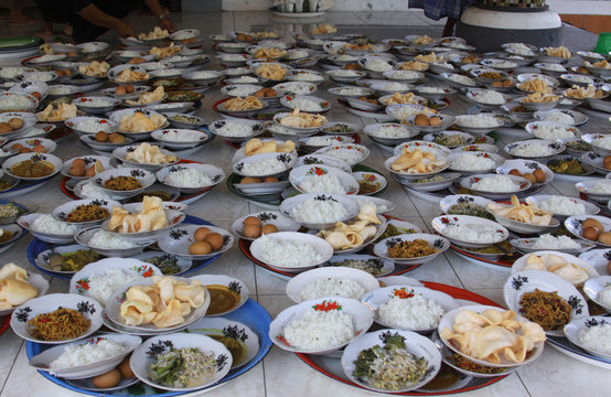 Plates with food at a ramadan ceremony in Gili Air